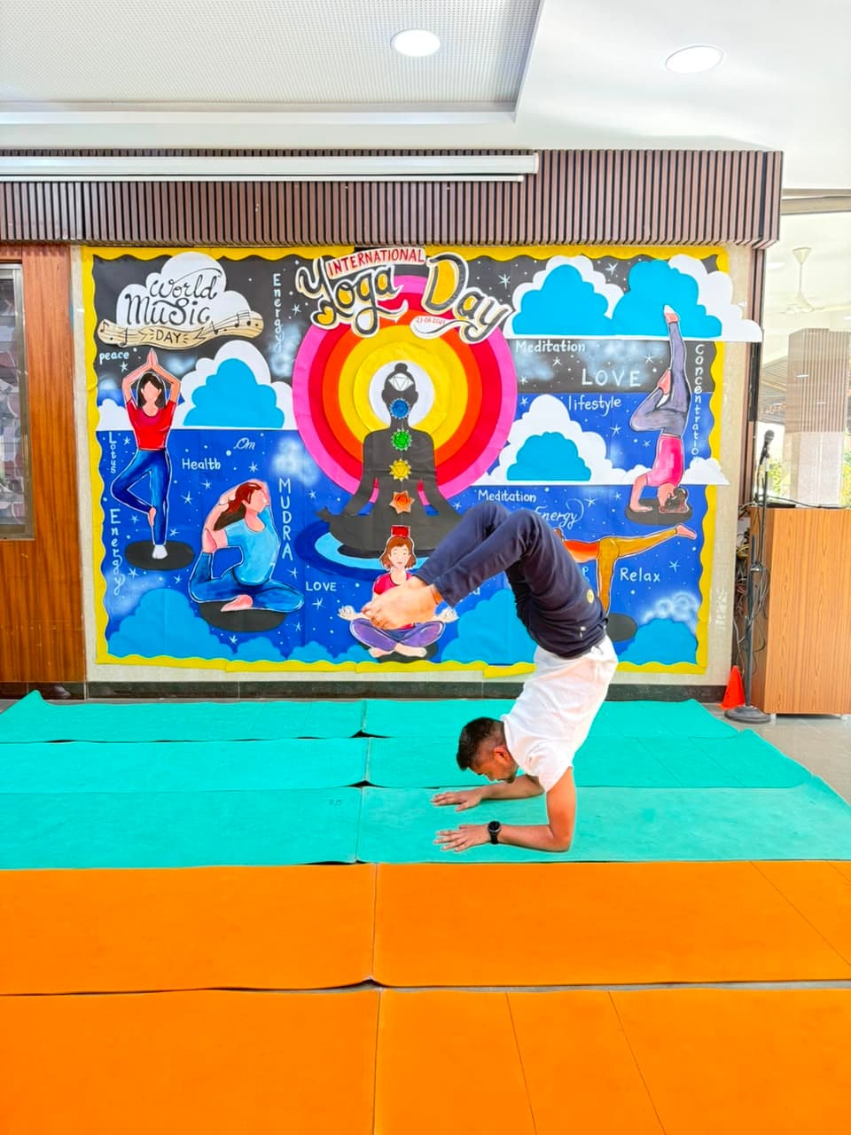 Yoga teacher in a deep hip opening pose
